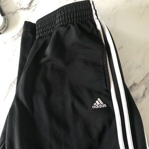 Black and white adidas 3 stripe pants